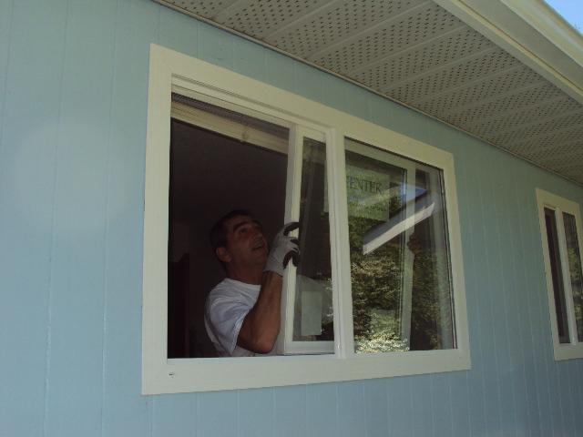 Stefan Zadravec of Sunny Aluminum installing new windows