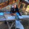 Stefan cutting soffits in backyard